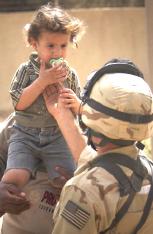 US Soldier with Iraqi Child